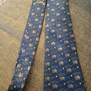 REAL RARE Vintage Hermes men’s Blue Tie with hippos, polka dots, and trees